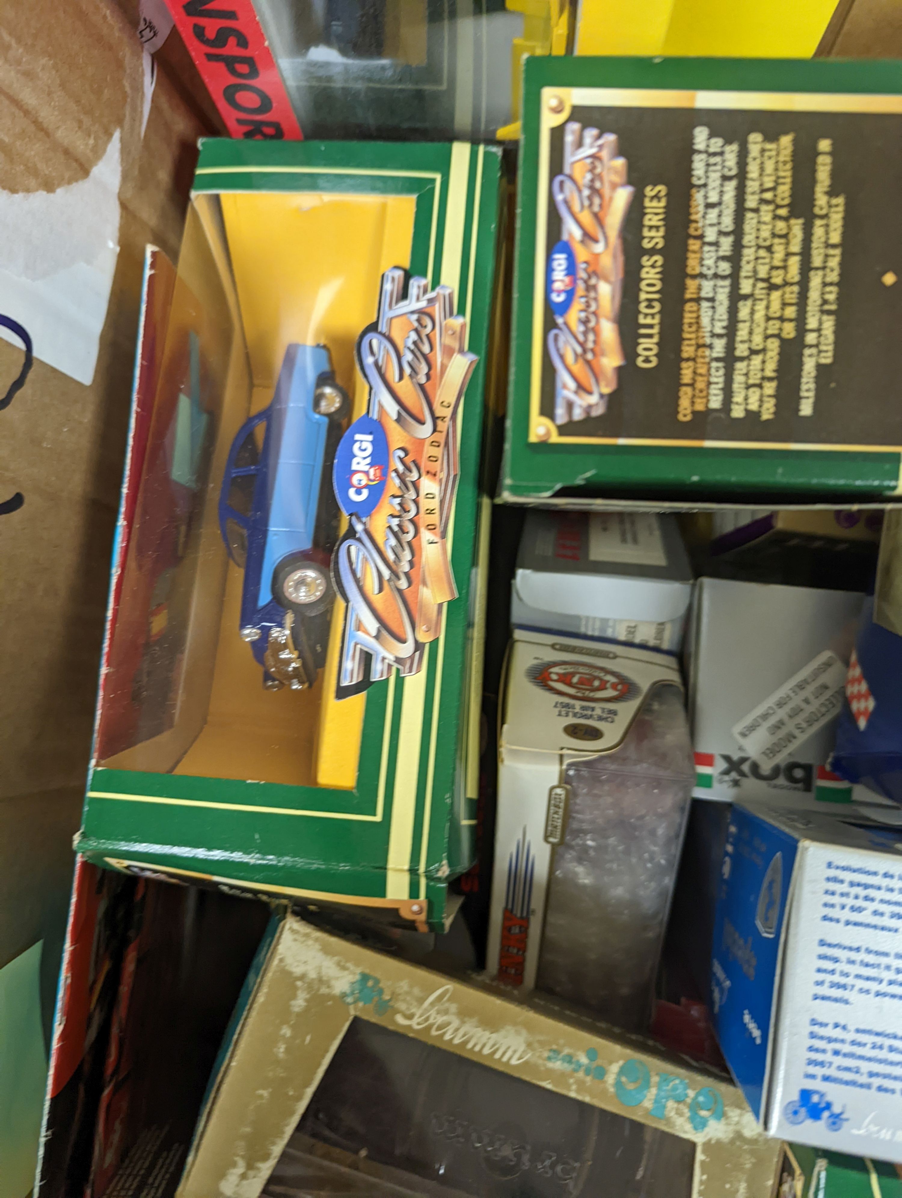 A group of assorted diecast cars including Brumm and Dinky.